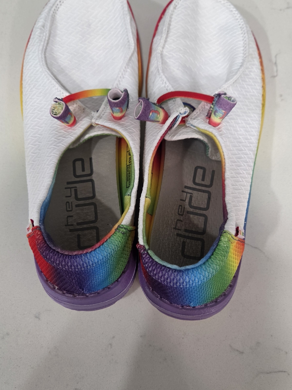 Hey Dude Women White Slip-On Flats with Rainbow Heel and Purple Sole(6)
